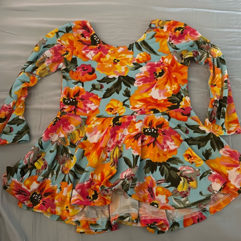 Peplum long sleeve top